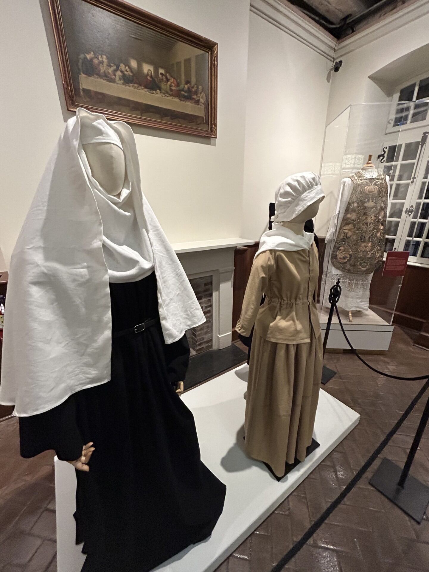 A display shows clothing residents of the Old Ursuline Convent typically wore.