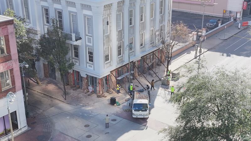 An aerial view of angled support beams installed on O'Keefe Avenue to hold up a crumbled facade.