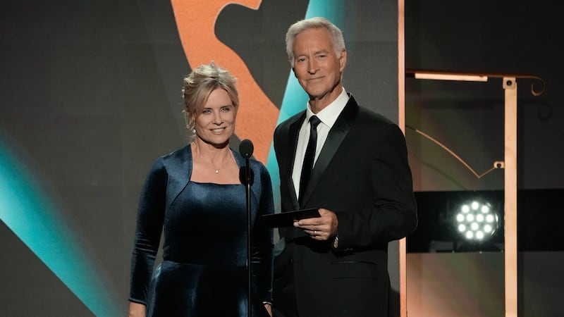 Mary Beth Evans, left, and Drake Hogestyn present the award for outstanding daytime talk...