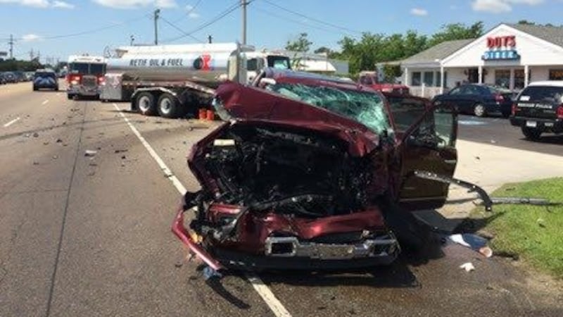 Car crash in Kenner leaves man in critical condition; Experienced Personal Injury Lawyer Kenner reviewing medical records and evidence with a client