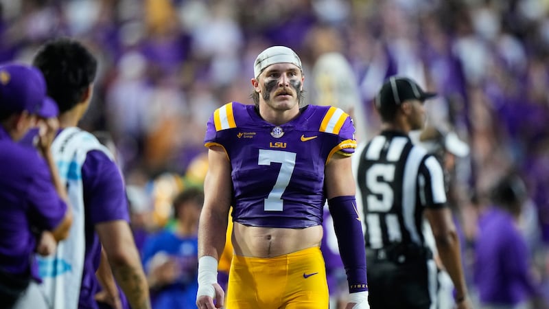 LSU linebacker Whit Weeks (7) walks on the sideline in the first half of an NCAA college...