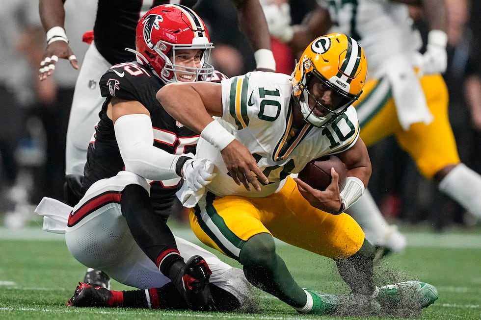 Atlanta Falcons linebacker Kaden Elliss (55) sacks Green Bay Packers quarterback Jordan Love...