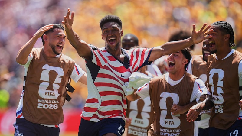 United States' Alex Freeman (16), second left, celebrates after scoring his side's second goal...