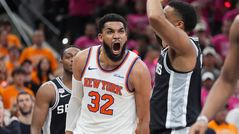 New York Knicks center Karl-Anthony Towns (32) yells during the second half of Game 1 of the...