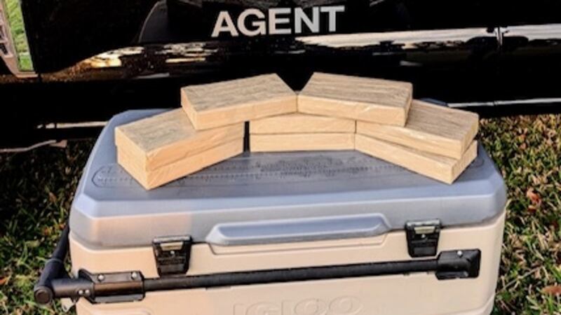Authorities arrested a driver after finding compressed blocks of suspected cocaine sealed...