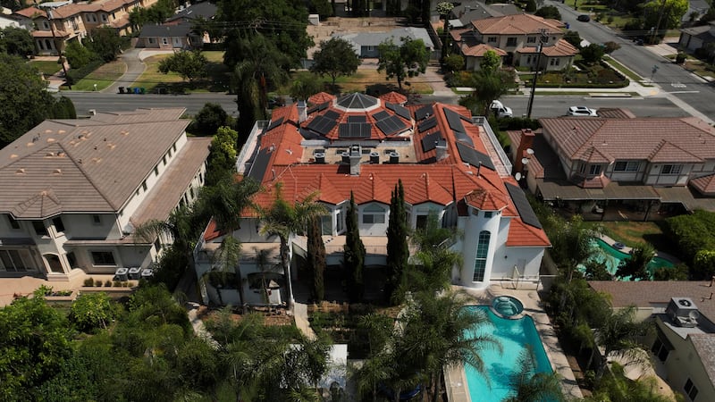 FILE - An aerial view shows the home of Silvia Zhang and Guojun Xuan on July 16, 2025, in...