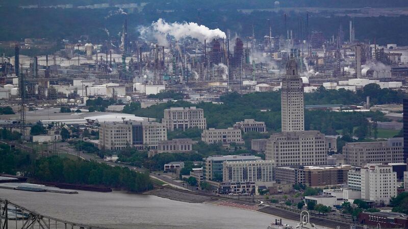 The ExxonMobil Baton Rouge Refinery complex is seen near the Louisiana State Capitol in Baton...