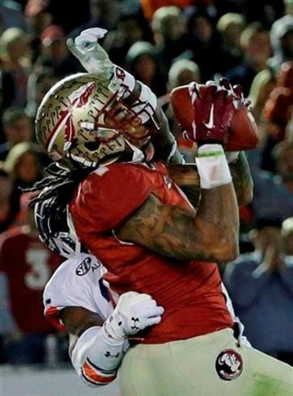 (AP Photo/David J. Phillip). Florida State's Kelvin Benjamin catches a touchdown pass during...